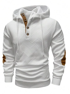 Close-up of men's white jacquard hoodie with brown elbow patches and buttoned collar