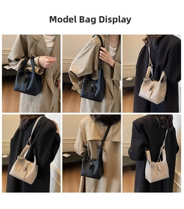 Détails du sac seau en cuir grainé avec bandoulière réglable et fermoir à boucle