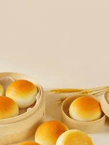 Detailed macro shot of realistic golden PU squishy buns in a rustic wooden steamer basket