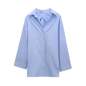 Close-up detail of light blue button-down shirt collar and size S tag on white background