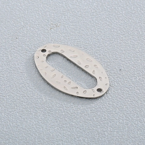 Hammered oval stainless steel jewelry charm with dual holes for necklace making