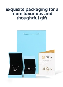 Close-up of moissanite necklace and ring set with GRA certificate in luxury packaging