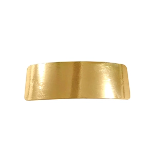 Detailed view of the brushed golden metal finish on the minimalist hair clip accessory