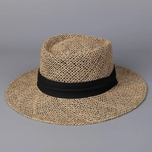 Wide brim woven straw sun hat with black ribbon for beach summer vacations