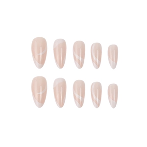 Almond-shaped press-on nails with nude pink base and white wavy flow patterns