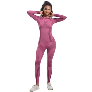 Close-up of seamless pink yoga set fabric showing breathable knit texture and contouring lines