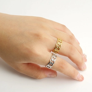 Minimalist chain link ring set in 18k gold and silver finish worn by female model