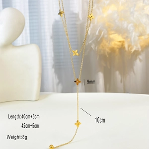 Detailed close-up of gold Y-shaped titanium clover necklace with dimensions and drop length