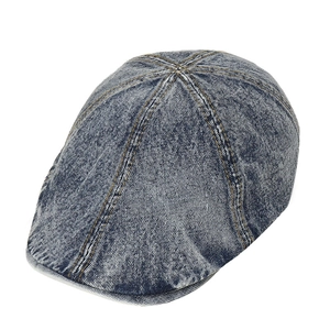 Vintage washed blue denim newsboy cap with classic yellow stitching for men and women
