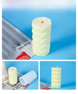 Close-up of geometric textured candle with 3D triangular cuts and silicone mold