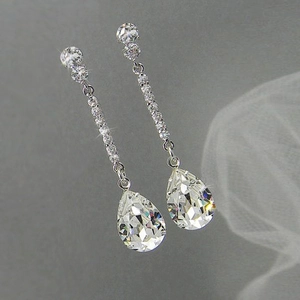Elegant pear cut AAA cubic zirconia drop earrings in silver finish for formal events