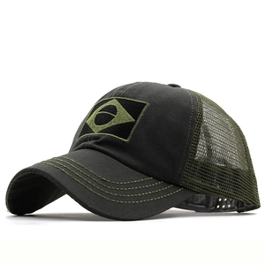 Detail of green Brazil flag trucker hat featuring breathable mesh and embroidery