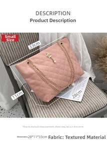 Pink quilted tote bag detail with pearl crown charm and chain strap measurements