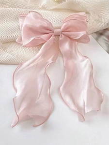 Pink silk bow hair clip with shimmering organza and long flowing ribbon streamers