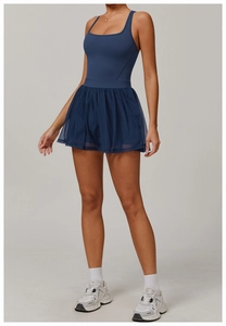 Detail view of double-layer mesh hem and breathable navy blue tennis dress for women