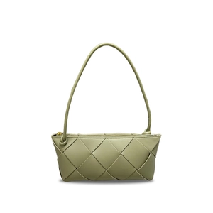Detail shot of light green woven leather crossbody bag with knot design and gold zipper