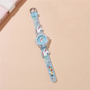Detail of light blue unicorn children watch with transparent case and silicone strap