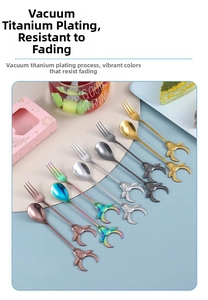 Detail of vacuum titanium plated stainless steel spoons and forks with ox head handles