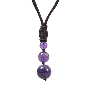 Detail of adjustable black cord necklace with three gradient purple amethyst beads