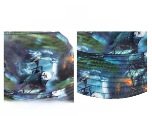 Detail of the high-density stitching and sailboat print on a deep blue bucket hat