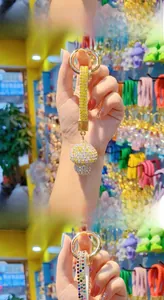 Detailed close-up of a mushroom keychain featuring sparkling crystals and a gold metal ring