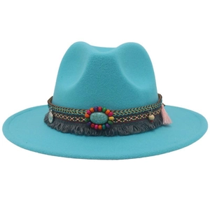 Detail of blue felt cowboy hat with colorful beaded band and turquoise stone ornament