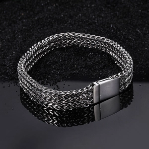 Detail of silver stainless steel keel chain bracelet with double row wheat link and buckle