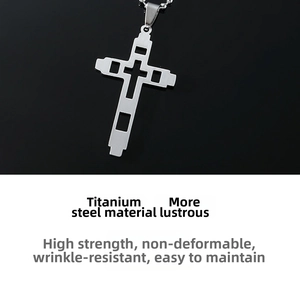 Detailed view of durable silver titanium steel cross pendant with geometric hollow design