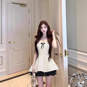 French style white polka dot summer dress with black lace trim and bow accent