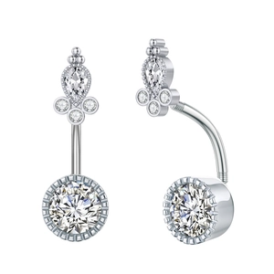Detailed view of silver navel piercing featuring large round and pear-shaped clear zircons