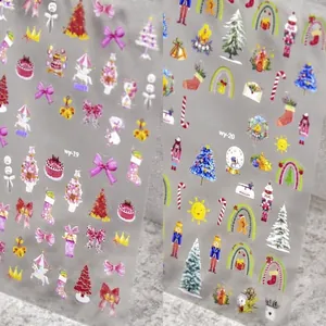 Japanese style Christmas nail art stickers featuring festive trees and bows in red and pink