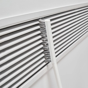 Long-handle radiator brush for cleaning gaps in furniture and air conditioners