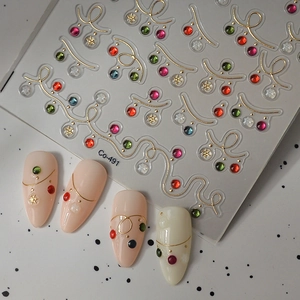 3D Christmas nail stickers Co-491 with gold curves, gems, and snowflakes for nail art