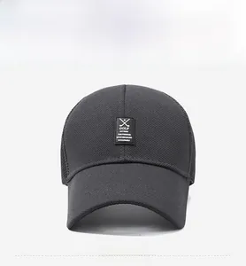 Detail of dark grey golf cap with breathable mesh back and embroidered logo patch