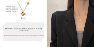 Detail of gold butterfly necklace showing 42.4cm chain length and titanium steel material