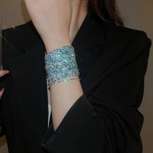 Detail of lake blue crystal multilayer wrap bracelet with micro-pave rhinestones