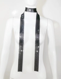Detail of shimmering black sequin skinny scarf necklace on a mannequin