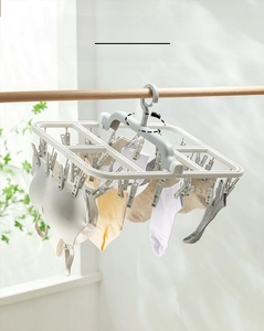 Detail of 360-degree rotating windproof hook on a multifunctional sock drying rack