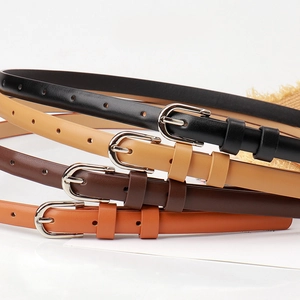 Slim women's leather belts with alloy pin buckles in black, brown, and orange colors