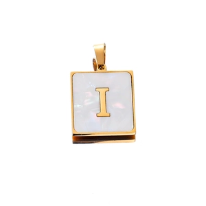 Detail of 22mm gold stainless steel square pendant with shell inlay and letter I engraving