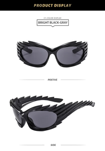 Detail view of black winged Y2K sunglasses with grey lenses in front and side angles