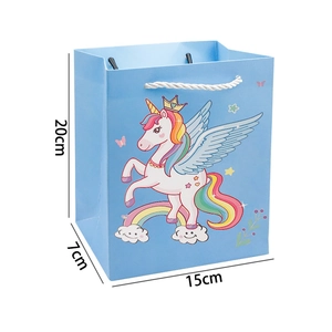 Blue paper gift bag with unicorn design and dimensions showing 20cm height and 15cm length