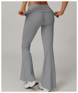 Detailed back view of high waisted grey flare yoga pants with crossover waist design