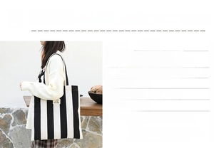 Detailed size specifications for striped canvas tote bag showing length and height dimensions