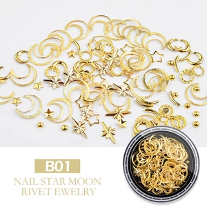 Detail of gold moon star and rivet nail art charms in B01 storage case set