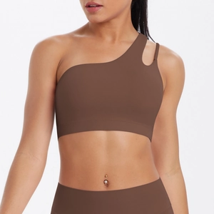 Close-up of brown one-shoulder sports bra with cutout detail on the strap