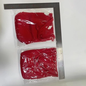 Detail view of two red velvet Christmas gift bags with rulers showing dimensions 35x40cm