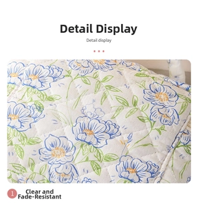 Detailed macro view of quilted floral cotton fabric with blue and yellow flower pattern