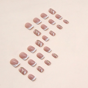 Short white French press-on nails with gold foil marble design and pink base