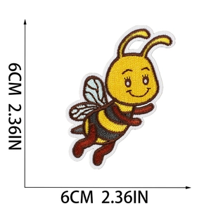 Detailed view of cartoon bee embroidery patch with dimensions showing 6cm width and height